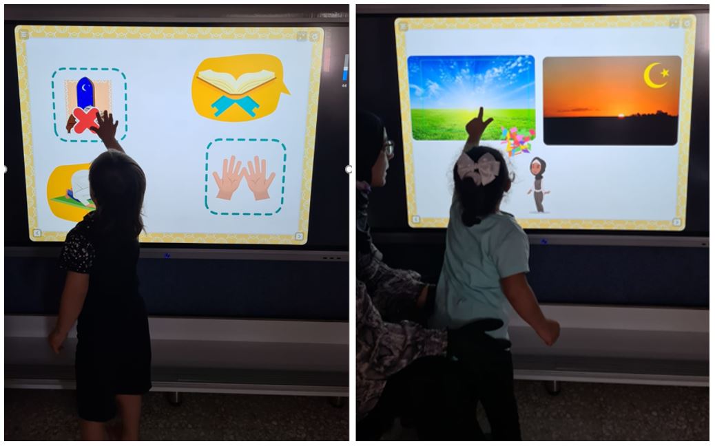 children playing the activity on the large screen